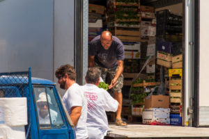 Sicily - Sunny impressions of the Aeolian Islands, also known as Aeolian Islands or Isole Eolie: Lipari, Stromboli, Salina, Vulcano, Panarea, Filicudi and Alicudi. Greengrocer with customers Sicily - Sunny impressions of the Aeolian Islands, also known as Aeolian Islands or Isole Eolie: Lipari, Stromboli, Salina, Vulcano, Panarea, Filicudi and Alicudi. Greengrocer with customers